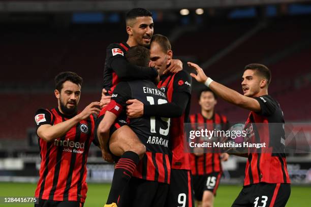 David Abraham of Eintracht Frankfurt celebrates with teammates after scoring his team's second goal during the Bundesliga match between VfB Stuttgart...