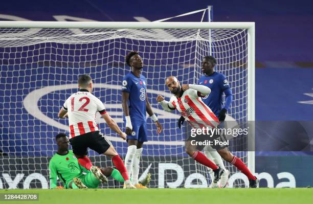 David McGoldrick of Sheffield United celebrates after scoring his team's first goal during the Premier League match between Chelsea and Sheffield...