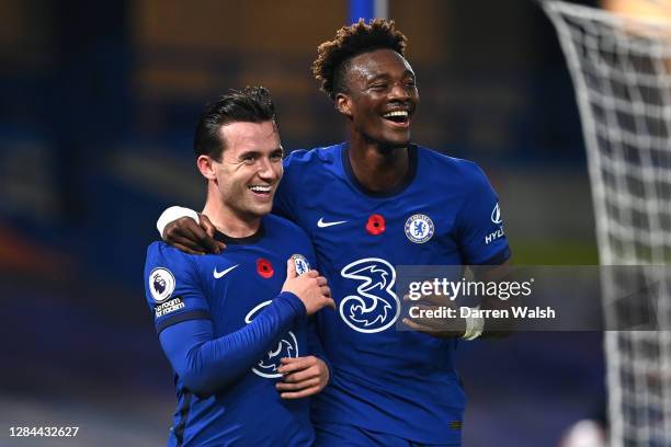 Ben Chilwell of Chelsea celebrates with teammate Tammy Abraham after scoring his team's second goal during the Premier League match between Chelsea...