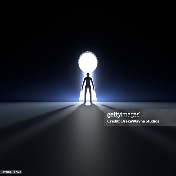 Figure Standing Alone In A Doorway, Foto de stock