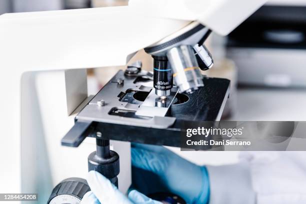 Microscope Lens View Photos and Premium High Res Pictures - Getty Images