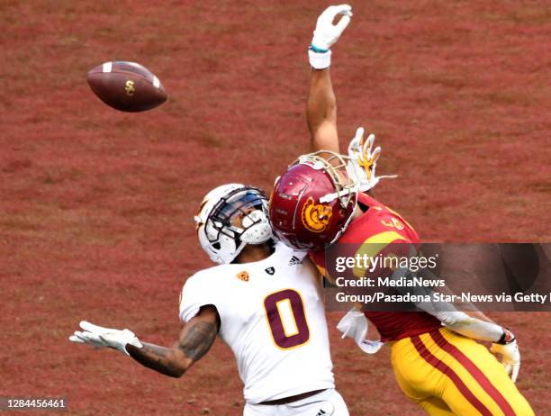 Wide receiver Amon-Ra St. Brown of the USC Trojans can"u2019t reach a pass over defensive back Jack Jones of the Arizona State Sun Devils in the...