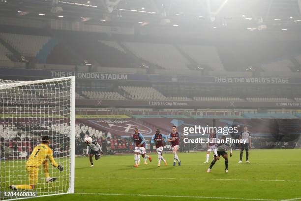 Ademola Lookman of Fulham has his penalty saved by Lukasz Fabianski of West Ham United during the Premier League match between West Ham United and...
