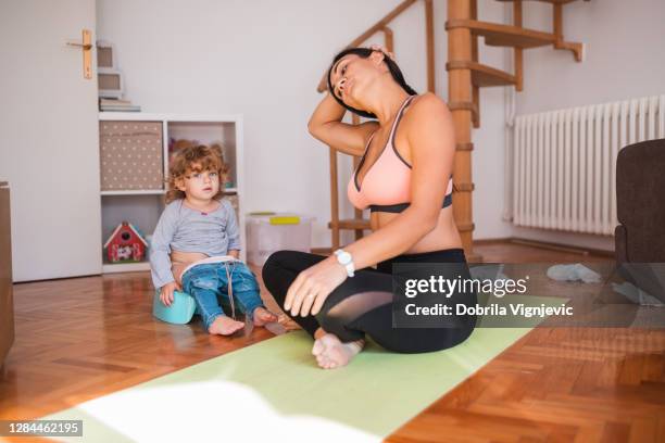 child having potty training and watching her mom stretch after training - girls peeing stock pictures, royalty-free photos & images