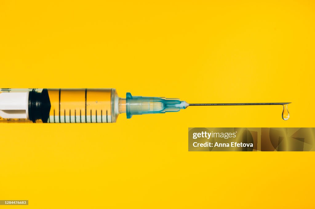 Modern syringe with liquid drug. The most anticipated procedure of the year