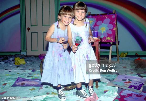 The Olsen Twins pose for a portrait during a private photo session on November 3, 1994 at Center Staging Rehearsal Studios in Los Angeles, California.