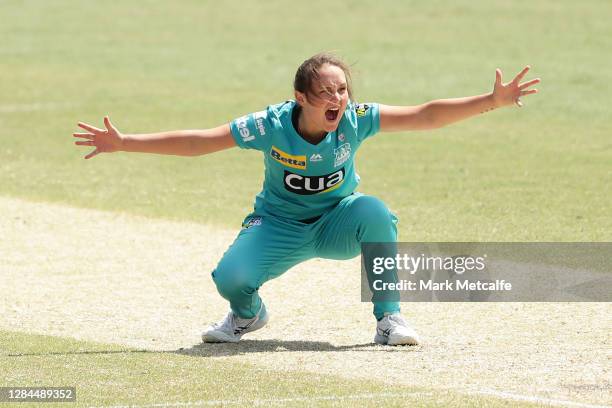 Amelia Kerr of the Heat celebrates taking the wicket of Elyse Villani of the Stars during the Women's Big Bash League WBBL match between the Brisbane...