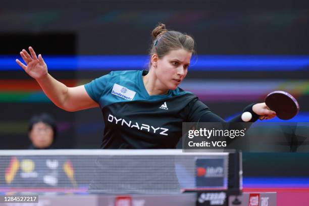 Petrissa Solja of Germany reacts in the Women's Singles group match against Wu Yue of the USA on day one of the 2020 ITTF Women's World Cup at Weihai...