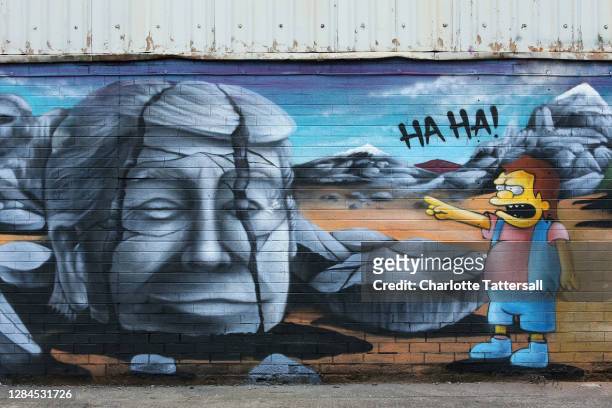 Mural depicting Donald Trump being laughed at by a character from The Simpsons is seen at Islington Mill on November 08, 2020 in Salford, England....