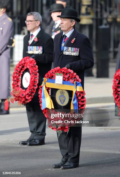 Veteran holds a wreath during the National Service of Remembrance at The Cenotaph on November 08, 2020 in London, England. Remembrance Sunday...