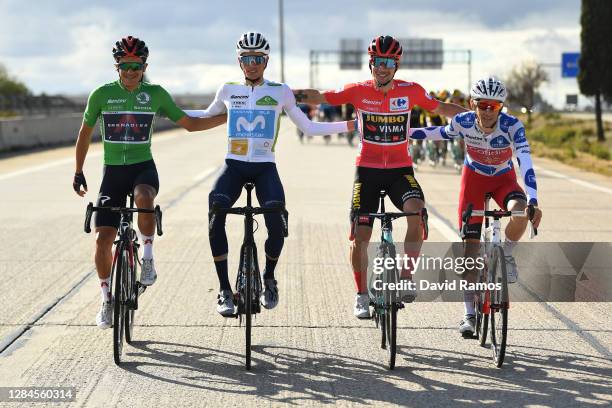 Richard Carapaz of Ecuador and Team INEOS - Grenadiers Green Points Jersey / Enric Mas Nicolau of Spain and Movistar Team White Best Young Jersey /...