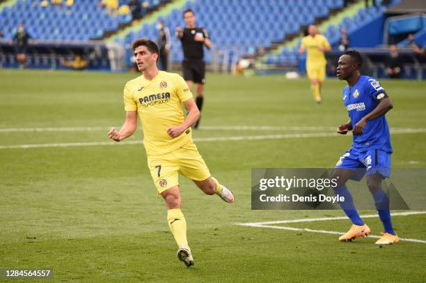 Gerard Moreno of Villarreal celebrates after scoring his team's third goal during the La Liga Santander match between Getafe CF and Villarreal CF at...