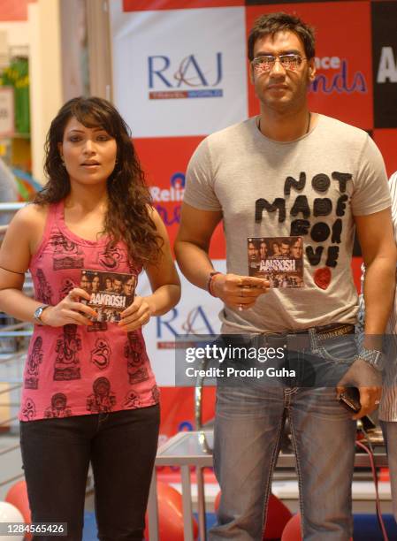 Amita Pathak and Ajay Devgan attend the film promotion 'AKROSH' on October 07, 2010 in Mumbai, India