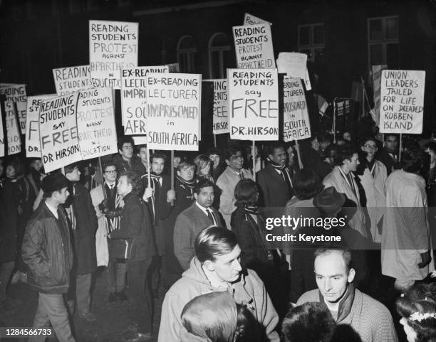 Students from the University of Reading carrying banners and placards join around 5,000 protestors on a rally against apartheid, marching four miles...