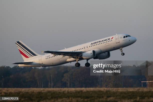 An Air France passenger plane takes off as the last commercial flight at Tegel Airport on the airport's closing day on November 08, 2020 in Berlin,...