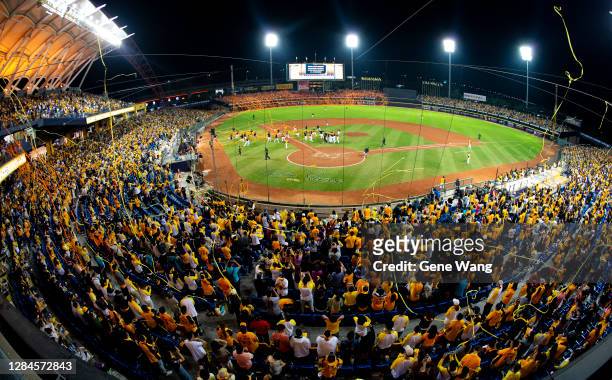 Fans from CTBC Brothers watch fans from Uni-Lions throw the ribbon from the left field after the Taiwan Series Game 7 between CTBC Brothers and...