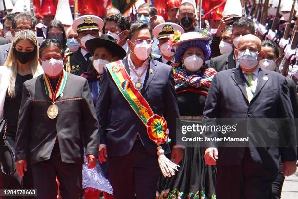 Newly elected President of Bolivia Luis Arce walks next to his Vice President David Choquehuanca after the swearing in ceremony at Plaza Murillo on...