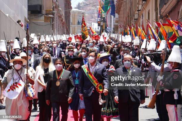 Newly elected President of Bolivia Luis Arce walks next to his Vice President David Choquehuanca after the swearing in ceremony at Plaza Murillo on...