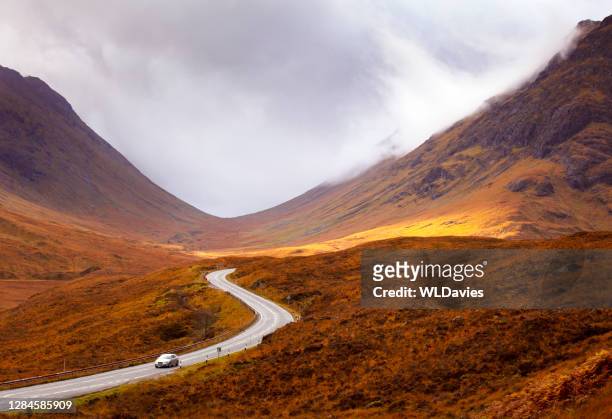 scottish highlands road - scotland stock pictures, royalty-free photos & images