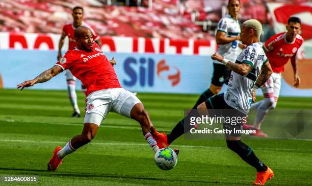Patrick of Internacional and Neilton of Coritiba fight for the ball during the match as part of Brasileirao Series A 2020 at Beira-Rio Stadium on...