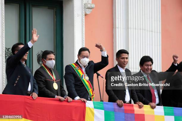 Newly elected President of Bolivia Luis Arce waves supporters next to his Vice President David Choquehuanca, President of the Bolivian Chamber of...