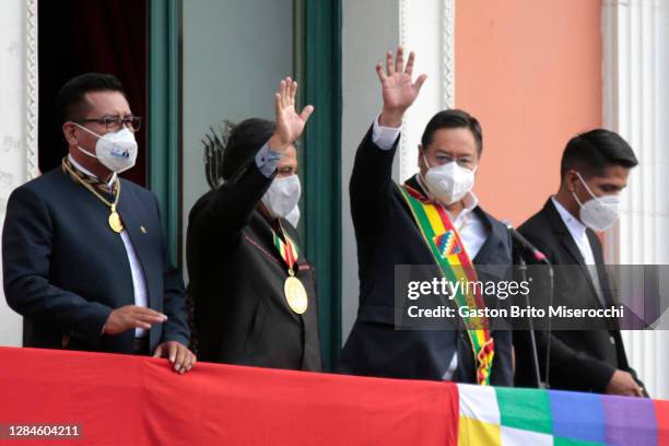 Newly elected President of Bolivia Luis Arce waves supporters next to his Vice President David Choquehuanca, President of the Bolivian Chamber of...