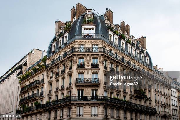 parisian tenement typical facade - paris france hotel stock pictures, royalty-free photos & images