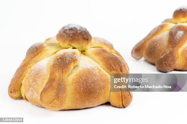 baked 'pan de muerto' or 'bread of the dead' - pan de muerto ストックフォトと画像