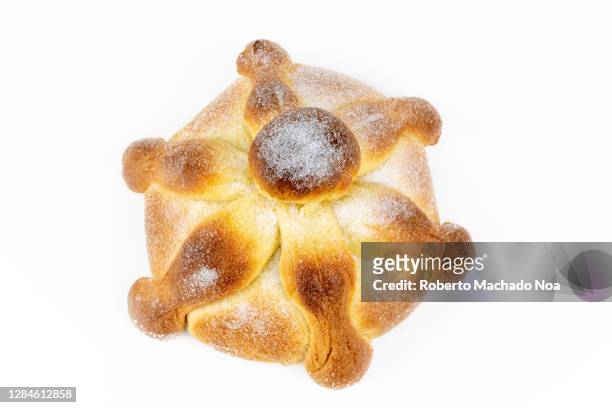 baked 'pan de muerto' or 'bread of the dead' - pan de muerto ストックフォトと画像