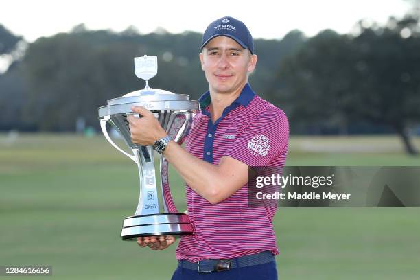 Carlos Ortiz of Mexico poses with the trophy after winning the Houston Open at Memorial Park Golf Course on November 08, 2020 in Houston, Texas.