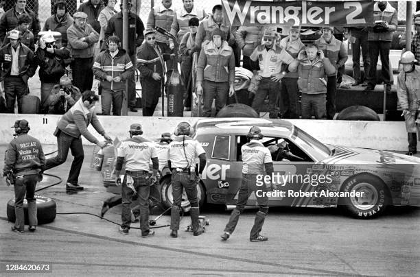 Driver Dale Earnhardt Sr. Makes a pit stop during the running of the 1981 Daytona 500 stock car race at Daytona International Speedway in Daytona...