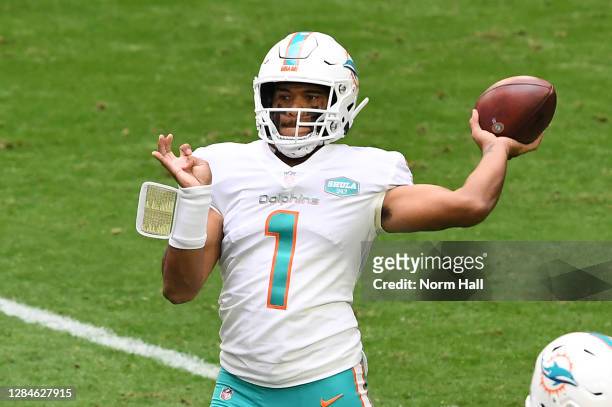 Tua Tagovailoa of the Miami Dolphins looks to pass during the first half against the Arizona Cardinals at State Farm Stadium on November 08, 2020 in...