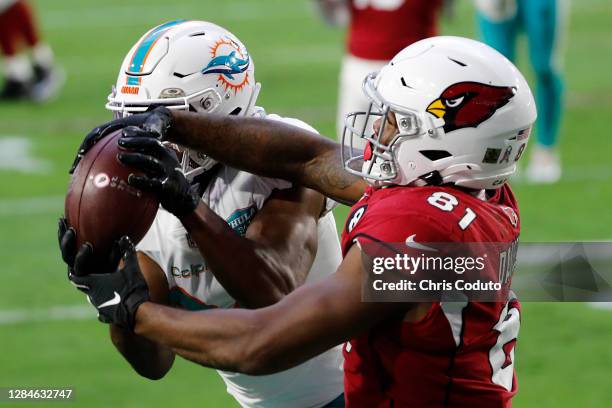 Darrell Daniels of the Arizona Cardinals catches a touchdown pass as Byron Jones of the Miami Dolphins defends during the second half at State Farm...