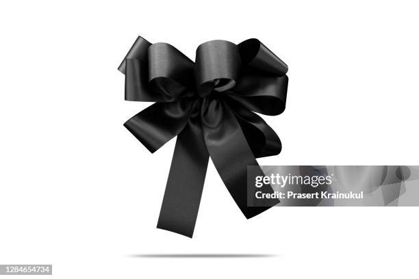 style black silk ribbon bow isolated on the white background - schleife stock-fotos und bilder