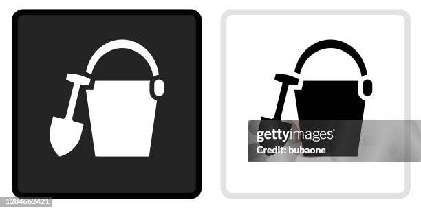 sand bucket icon on black button with white rollover - white bucket stock illustrations