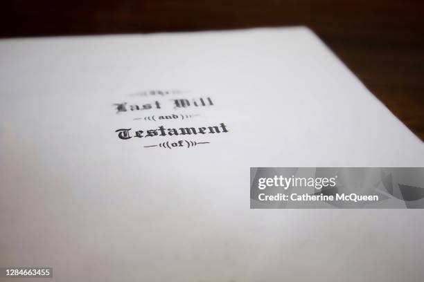 last will & testament on wooden desk - coroner document stock pictures, royalty-free photos & images