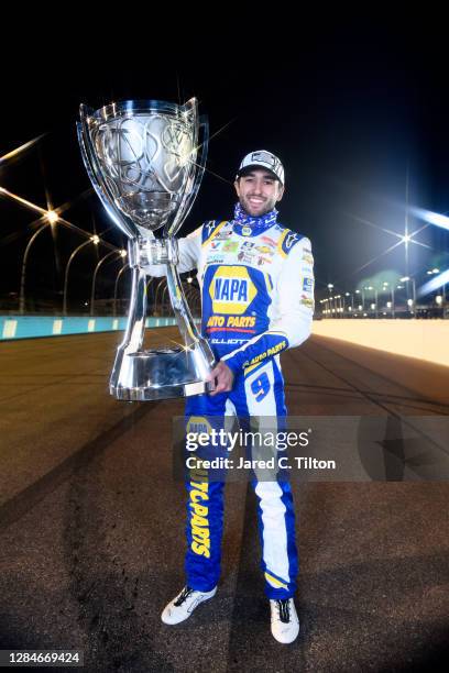 Chase Elliott, driver of the NAPA Auto Parts Chevrolet, poses for a photo after winning the NASCAR Cup Series Season Finale 500 and the 2020 NASCAR...