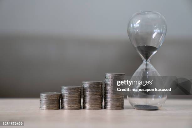 business concept with coins growth and collecting and saving. - debt collector stockfoto's en -beelden