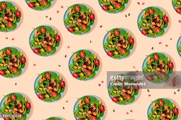 illustrazioni stock, clip art, cartoni animati e icone di tendenza di pattern of plates of fresh ready-to-eat vegan salad - insalata