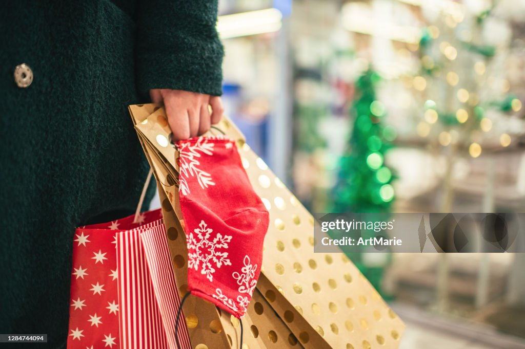 Christmas shopping with protective mask during COVID-19