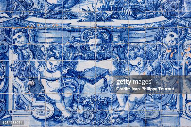 azulejos tiles on the facade of capela das almas, an 18th century chapel in porto, portugal - portuguese tile stock pictures, royalty-free photos & images