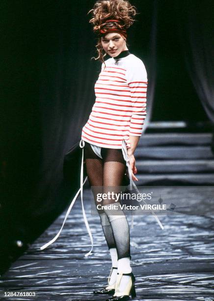 Milla Jovovich walks the runway during the Jean Paul Gaultier Ready to Wear Spring/Summer 1997 fashion show as part of the Paris Fashion Week on...