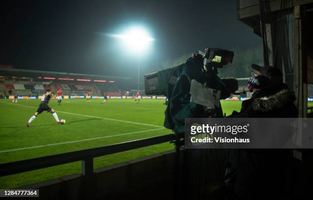 Live television camera operator during the Emirates FA Cup match between F.C. United of Manchester and Doncaster Rovers at Broadhurst Park on...