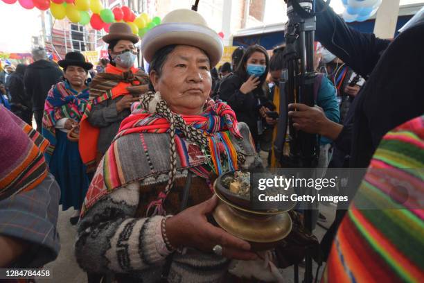 An Amautas del Kollasuyo takes part in welcoming ceremony for Former president of Bolivia Evo Morales as he crosses the border between Bolivia and...