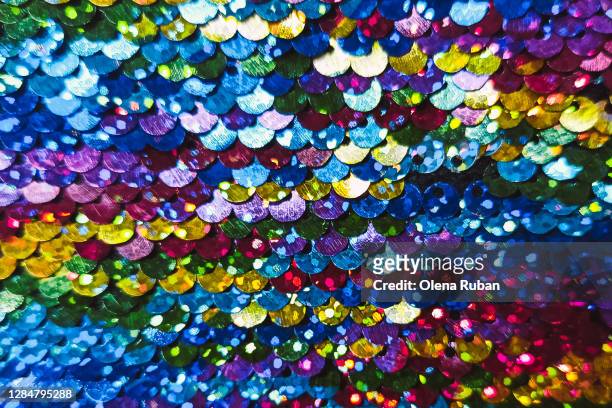colored shiny fabric beautifully crumpled for design - glam rock stock pictures, royalty-free photos & images