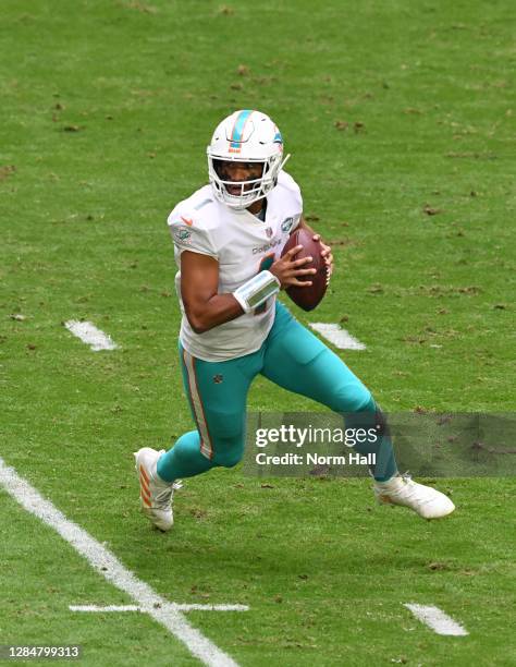 Tua Tagovailoa of the Miami Dolphins looks to throw the ball against the Arizona Cardinals at State Farm Stadium on November 08, 2020 in Glendale,...