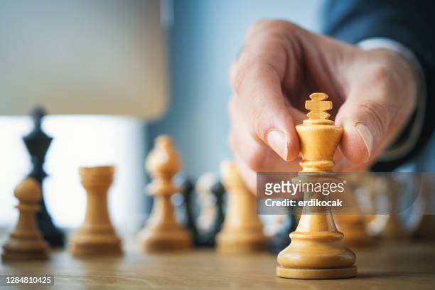 business strategy - chess king stock pictures, royalty-free photos & images