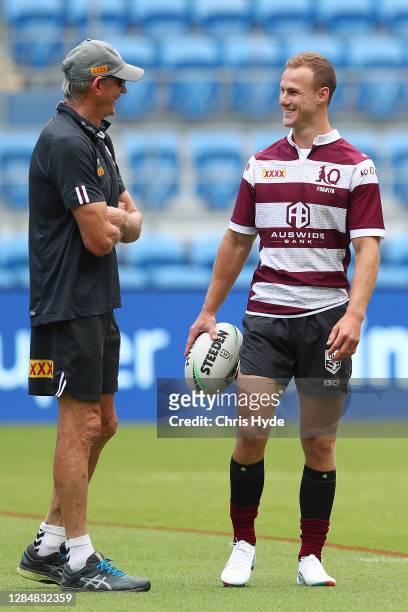 Coach Wayne Bennett talks with captain Daly Cherry-Evans during the Queensland Maroons State of Origin captain's run at C Bus Stadium on November 10,...