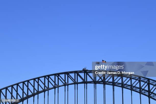 The Australian Aboriginal flag flies atop the Sydney Harbour Bridge alongside the Australian National flag in respect of NAIDOC week on November 10,...