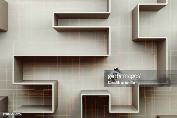 businesswoman walking in maze - cubicle wall stock pictures, royalty-free photos & images